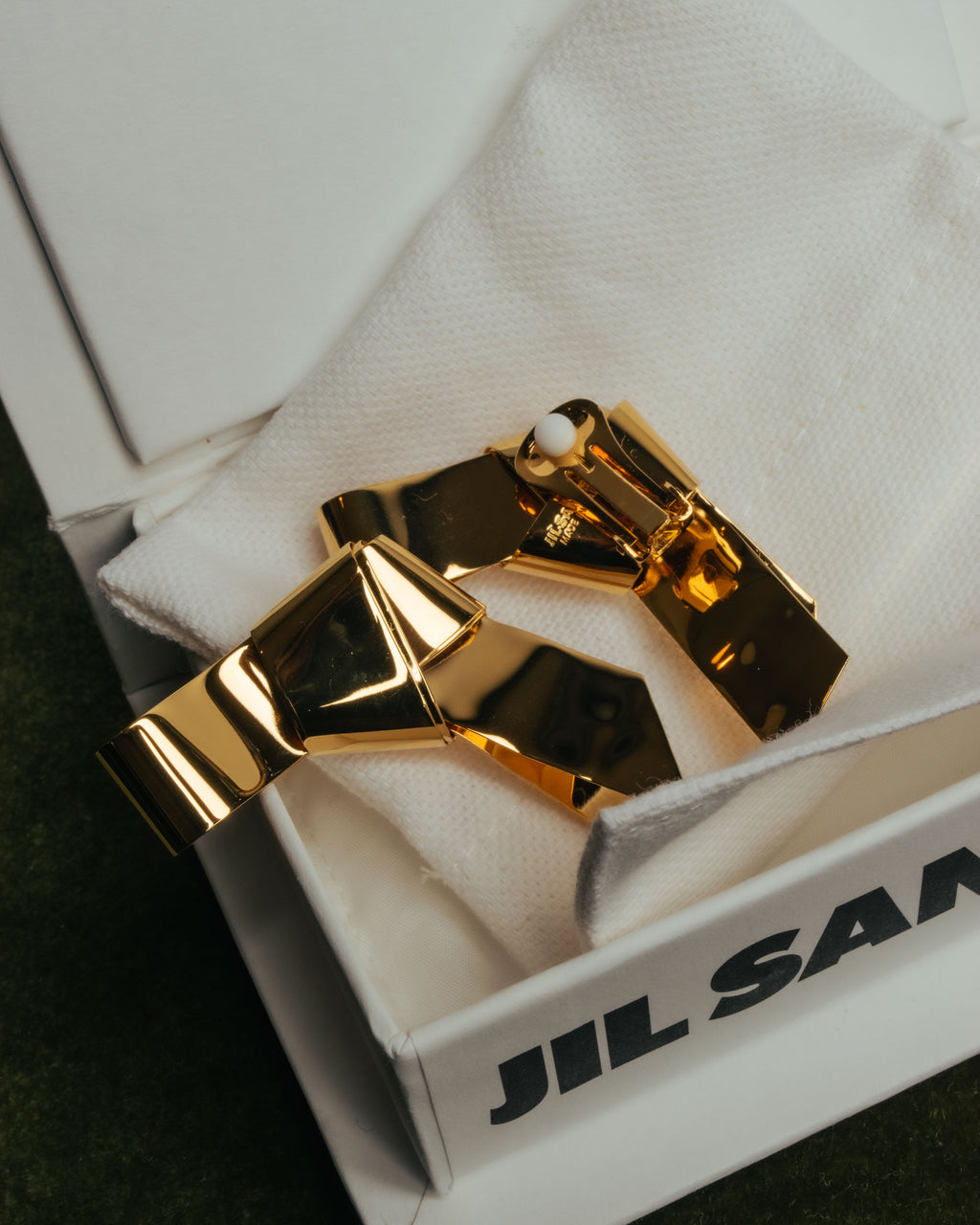 “JIL SANDER” 2021 sculptural ribbon metal clip earrings