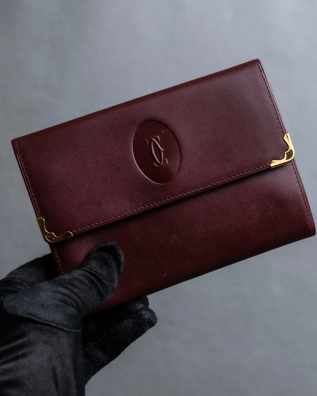 "Cartier" Les Must de Cartier bordeaux color leather wallet