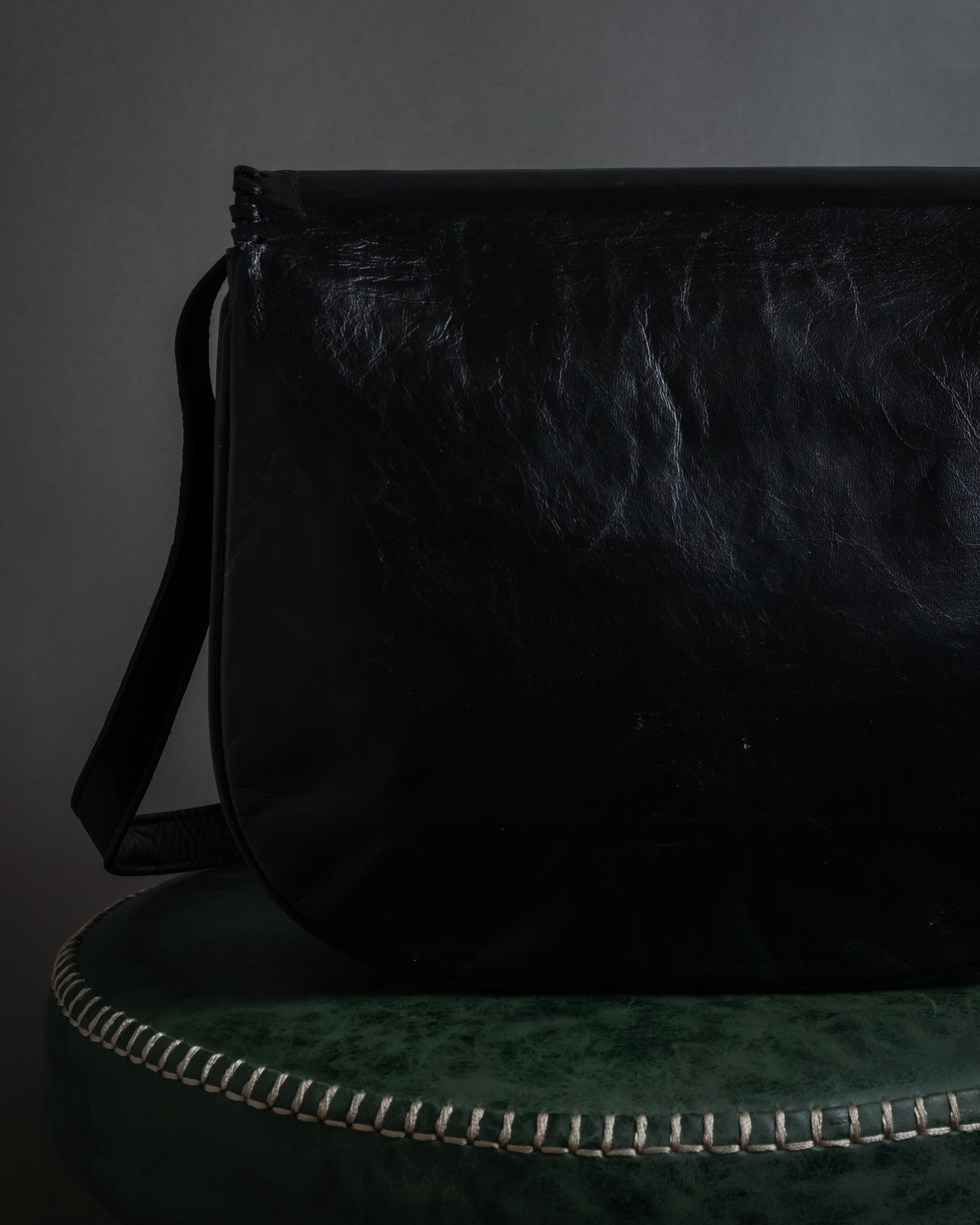 "YVES SAINT LAURENT" 80's-90's Logo engraved tassel detail bag