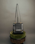 -SPECIAL- “HERMÈS” 80’s-90’s Camargue black leather and canvas shoulder bag
