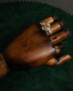 “DIOR” 2010’s sculptural turtle floral motif ring