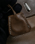 "Mademoiselle Accessories"
 Silver parts design leather one handle bag