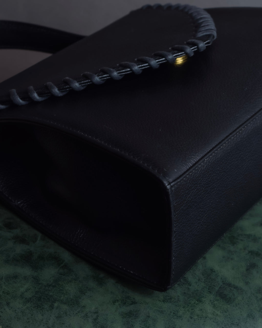 "YVES SAINT LAURENT" Hand stitched design trapezoid leather bag