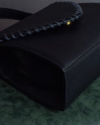 "YVES SAINT LAURENT" Hand stitched design trapezoid leather bag