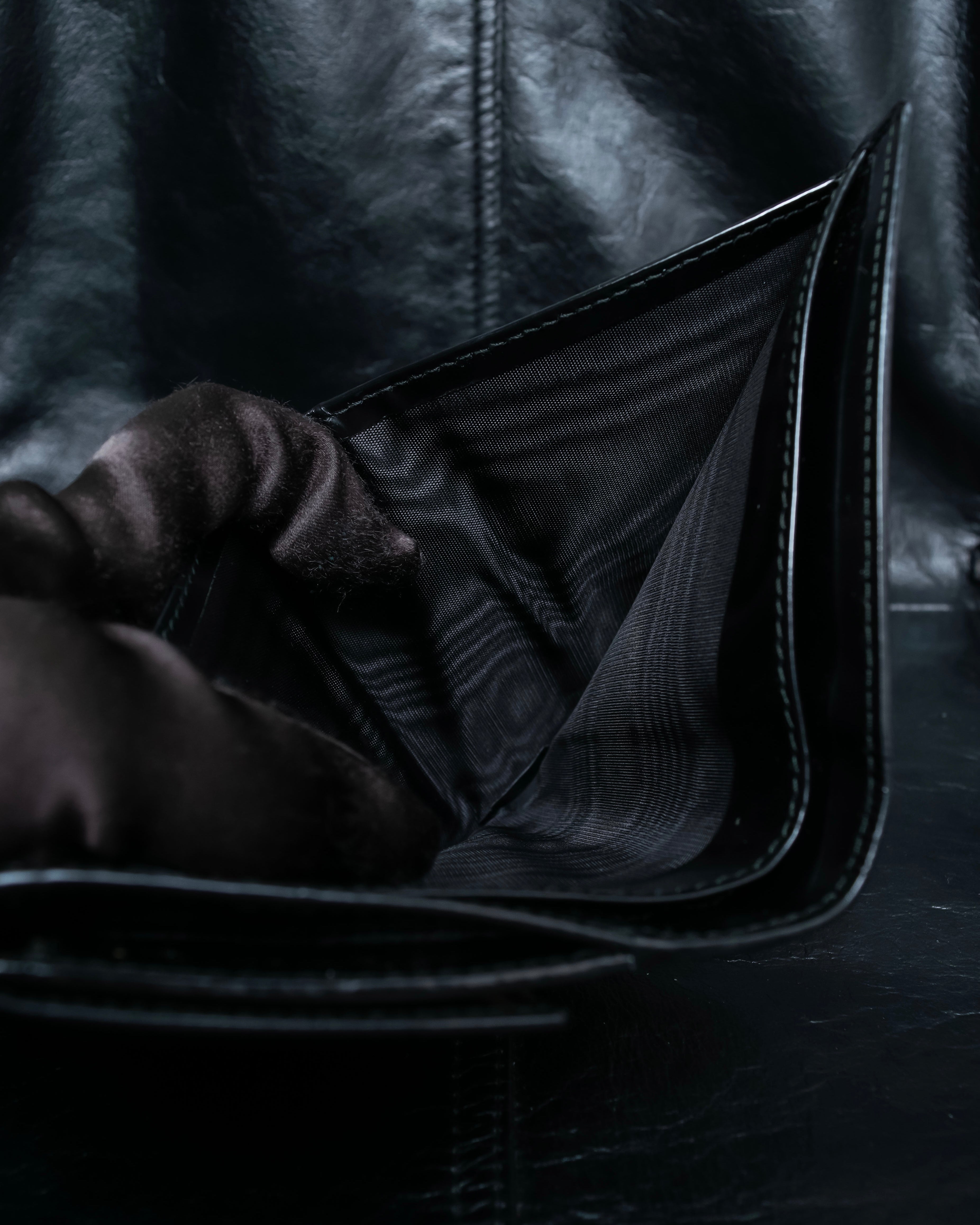 "GUCCI" Canvas and leather bi-fold wallet