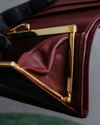 "Cartier" Les Must de Cartier bordeaux color leather wallet