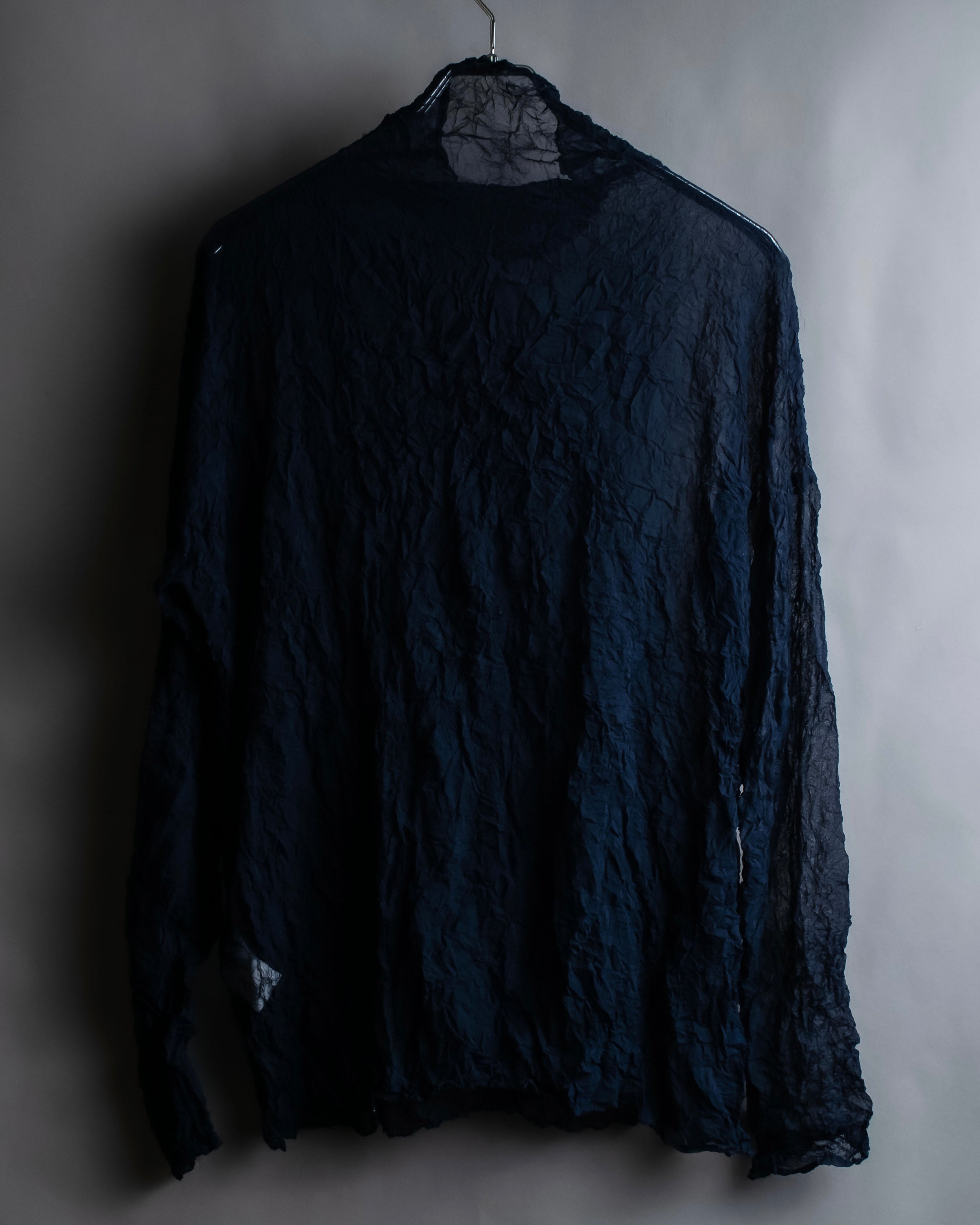 "ISSEY MIYAKE PERMANENTE"
Washed high neck sheer pullover