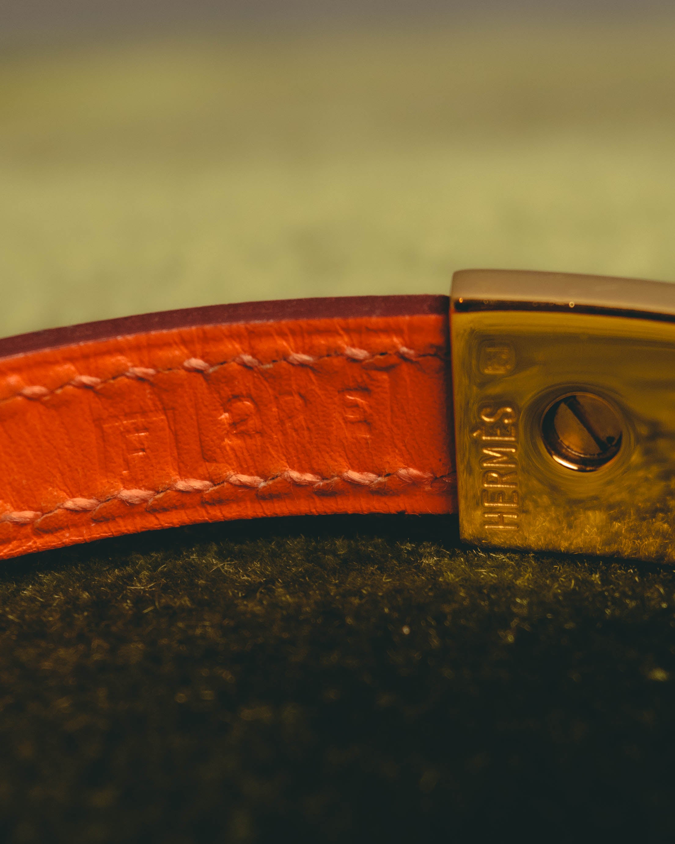 "Hermès" 00's Vibrant orange leather bracelet