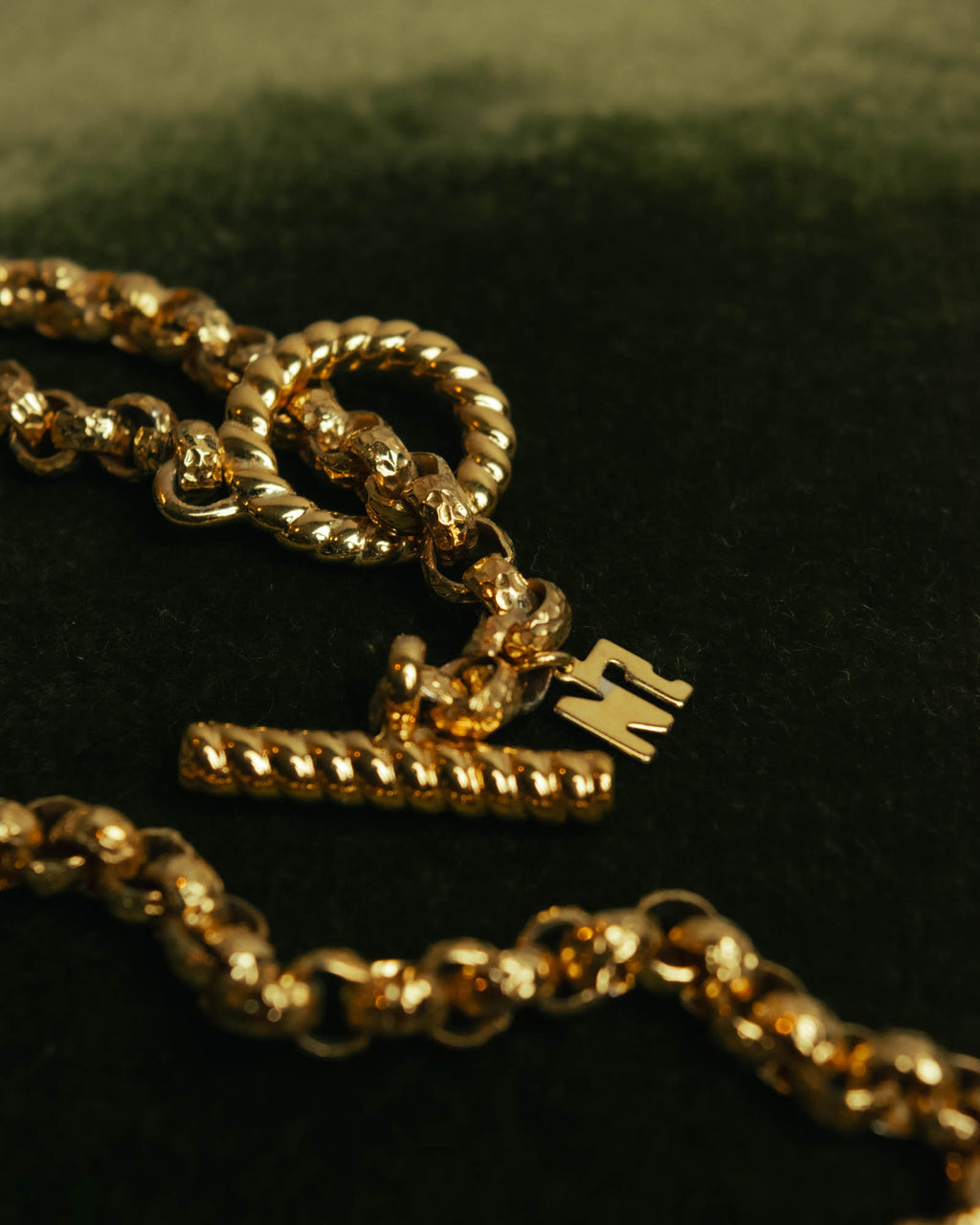 “NINA RICCI” Late 80’s-90’s gold tone openwork pendant necklace