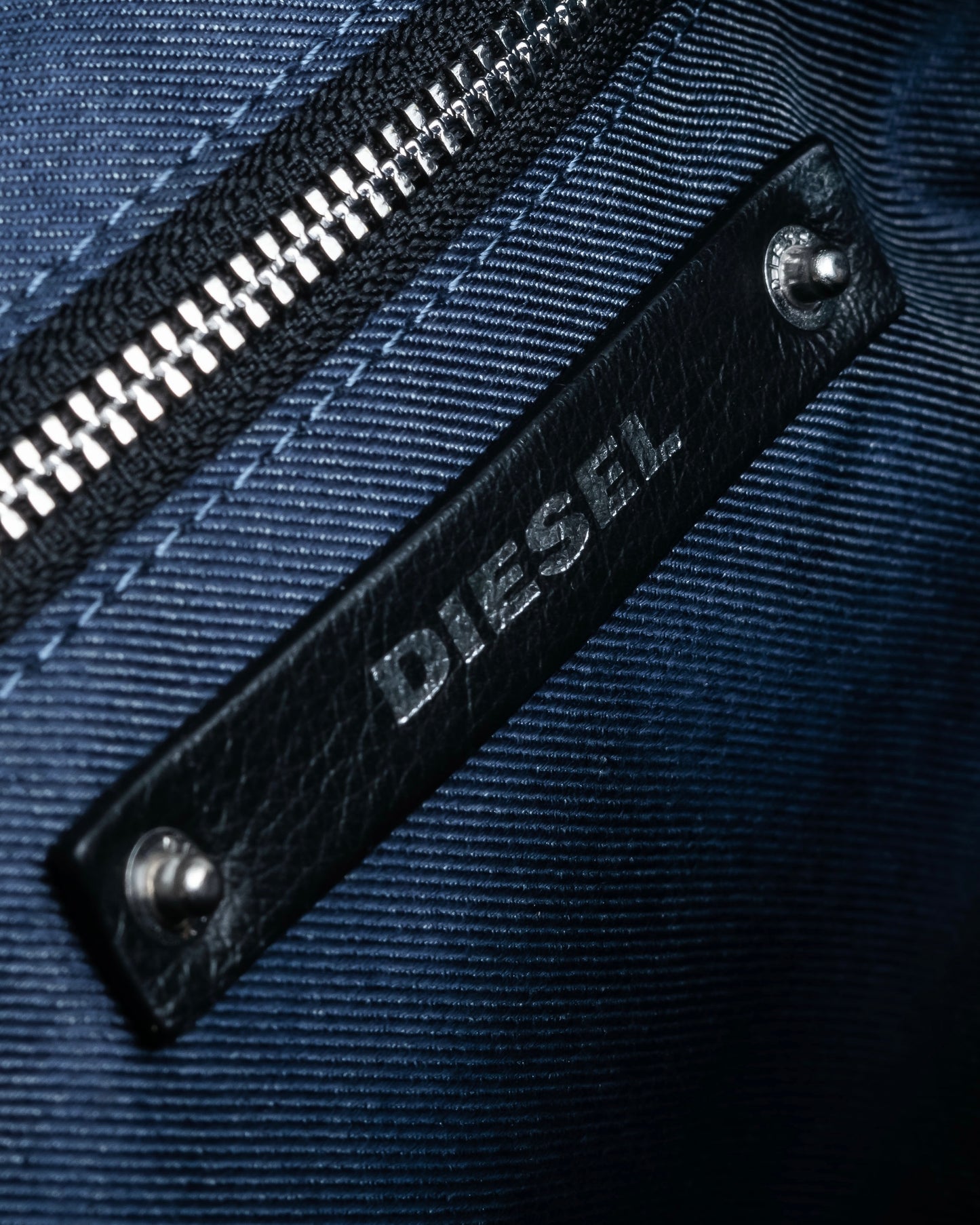 "DIESEL" Decorative zip design leather backpack