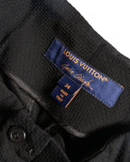 ウエスト内側に配されたメインタグのクローズアップ。Louis VuittonおよびMarc Jacobs表記、サイズ34、MADE IN ITALYの表記が確認できる。