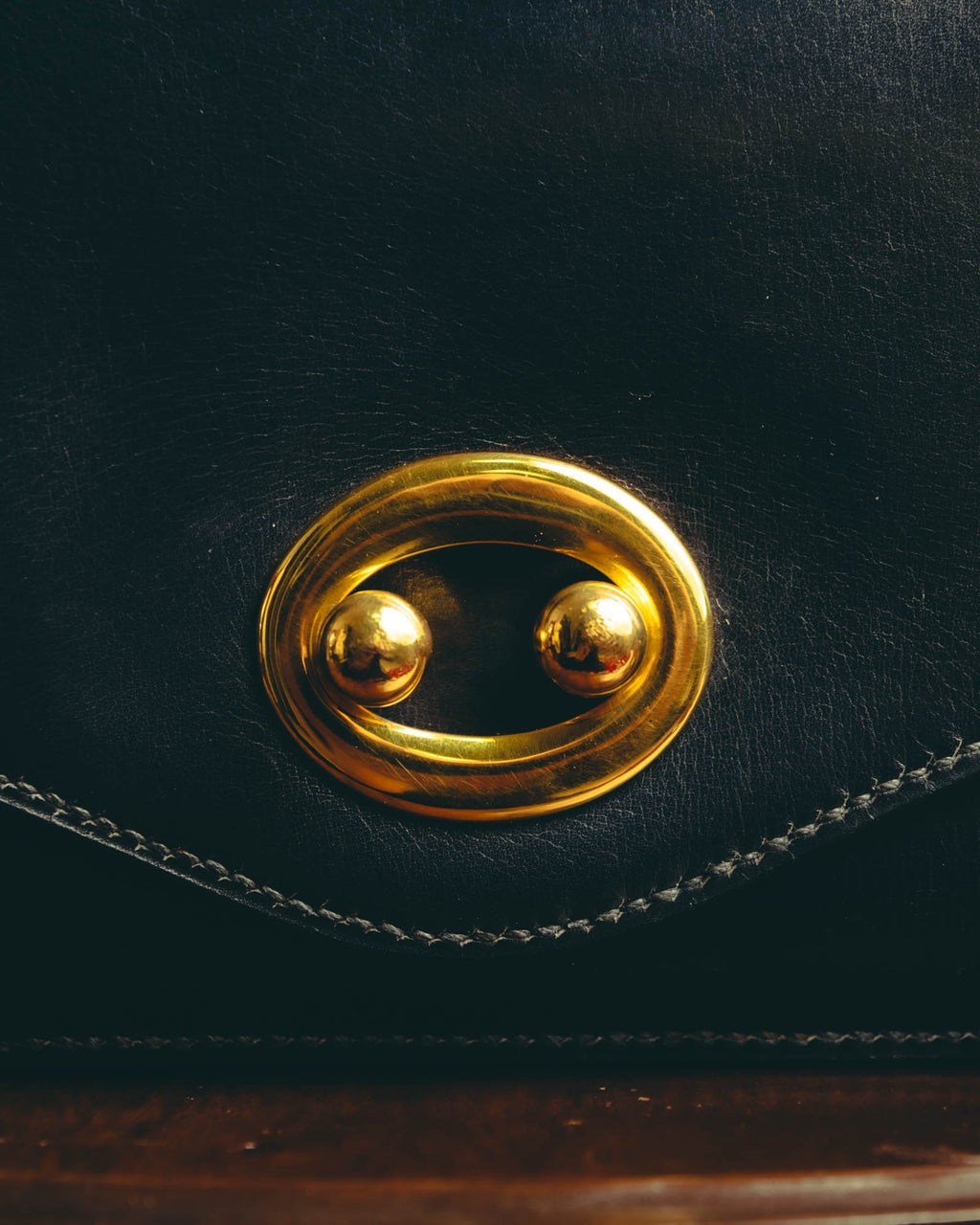 -SPECIAL- “HERMÈS” 50’s-60’s sculptural oval clasp midnight navy leather handbag