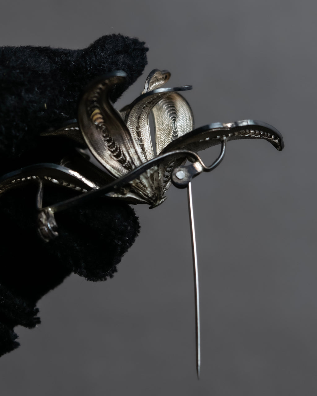 "Vintage petal motif broach"