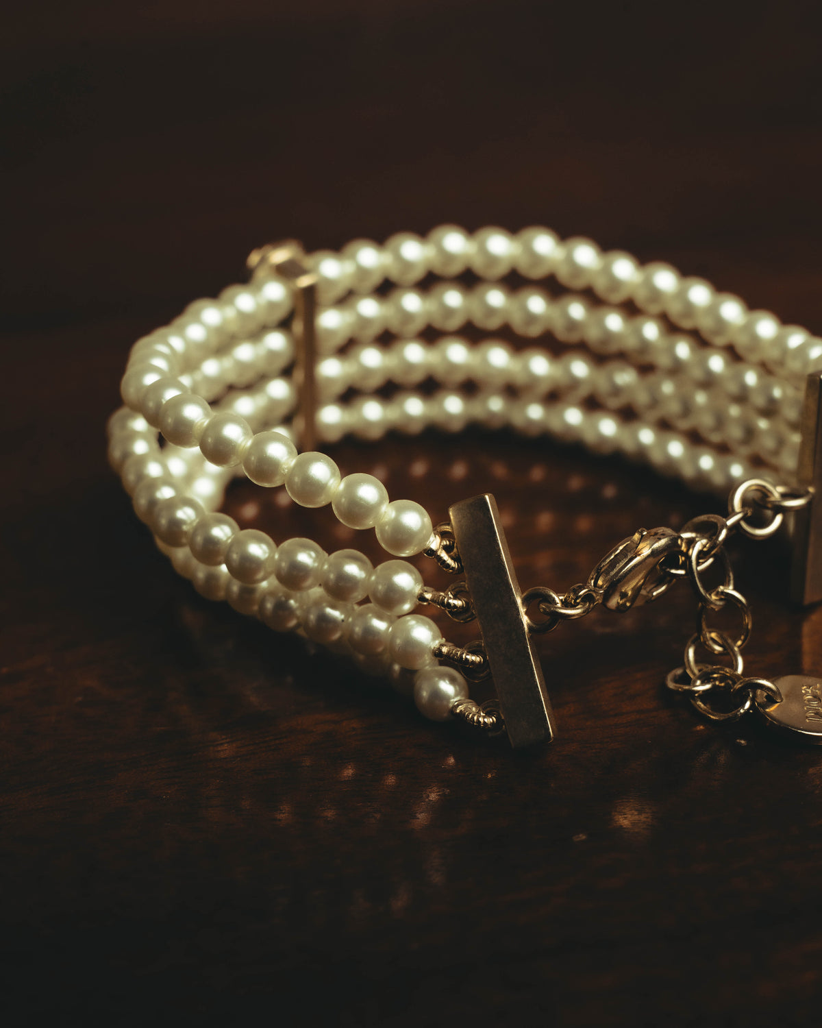 –SPECIAL– “Christian Dior” 2018-2025 Four-strand faux pearl bracelet with sculptural oval accents