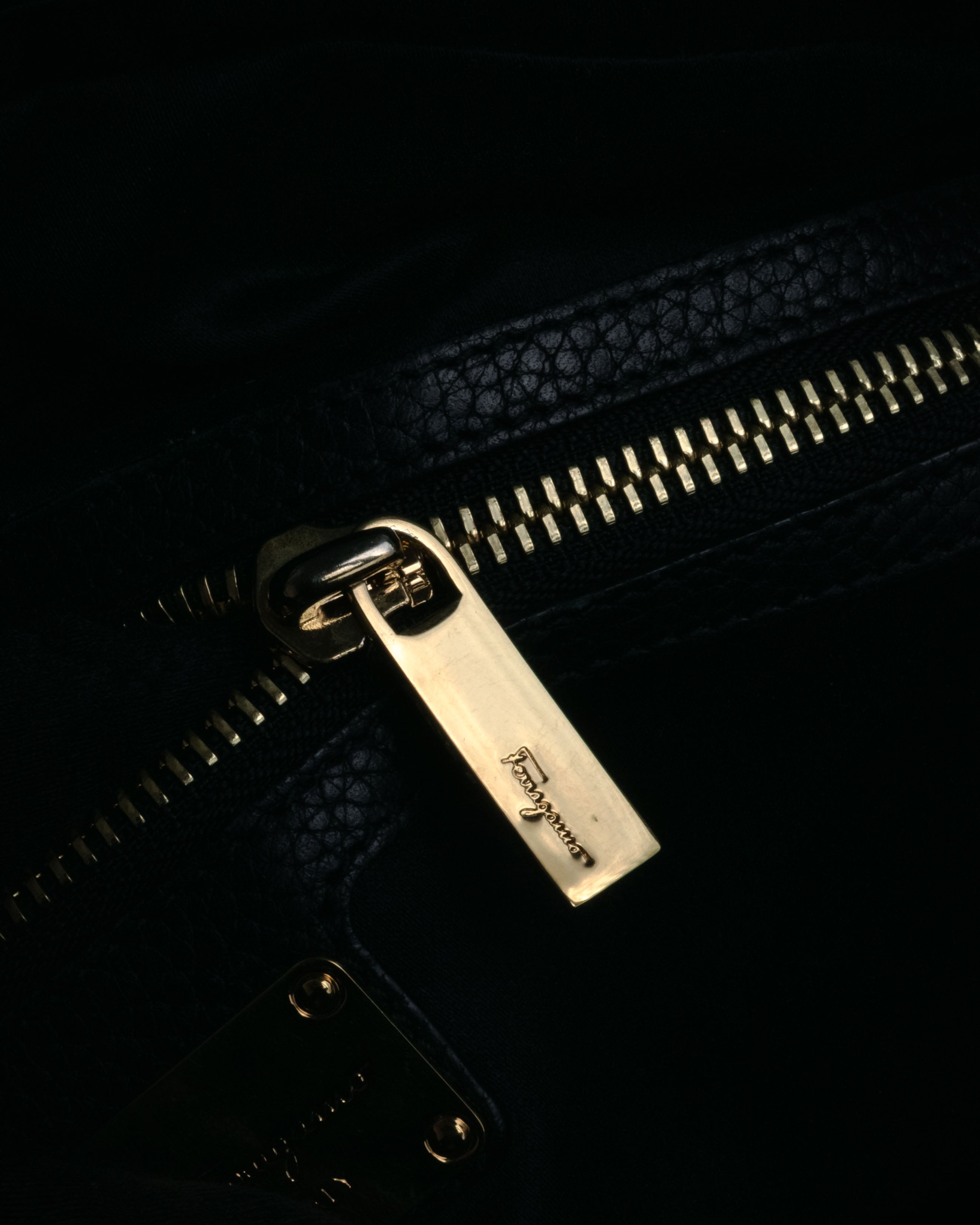 “Salvatore Ferragamo” 2000’s Pebbled leather turn lock bag