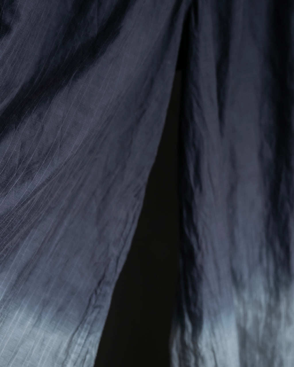 "me ISSEY MIYAKE"
 Color gradient washer processed pants