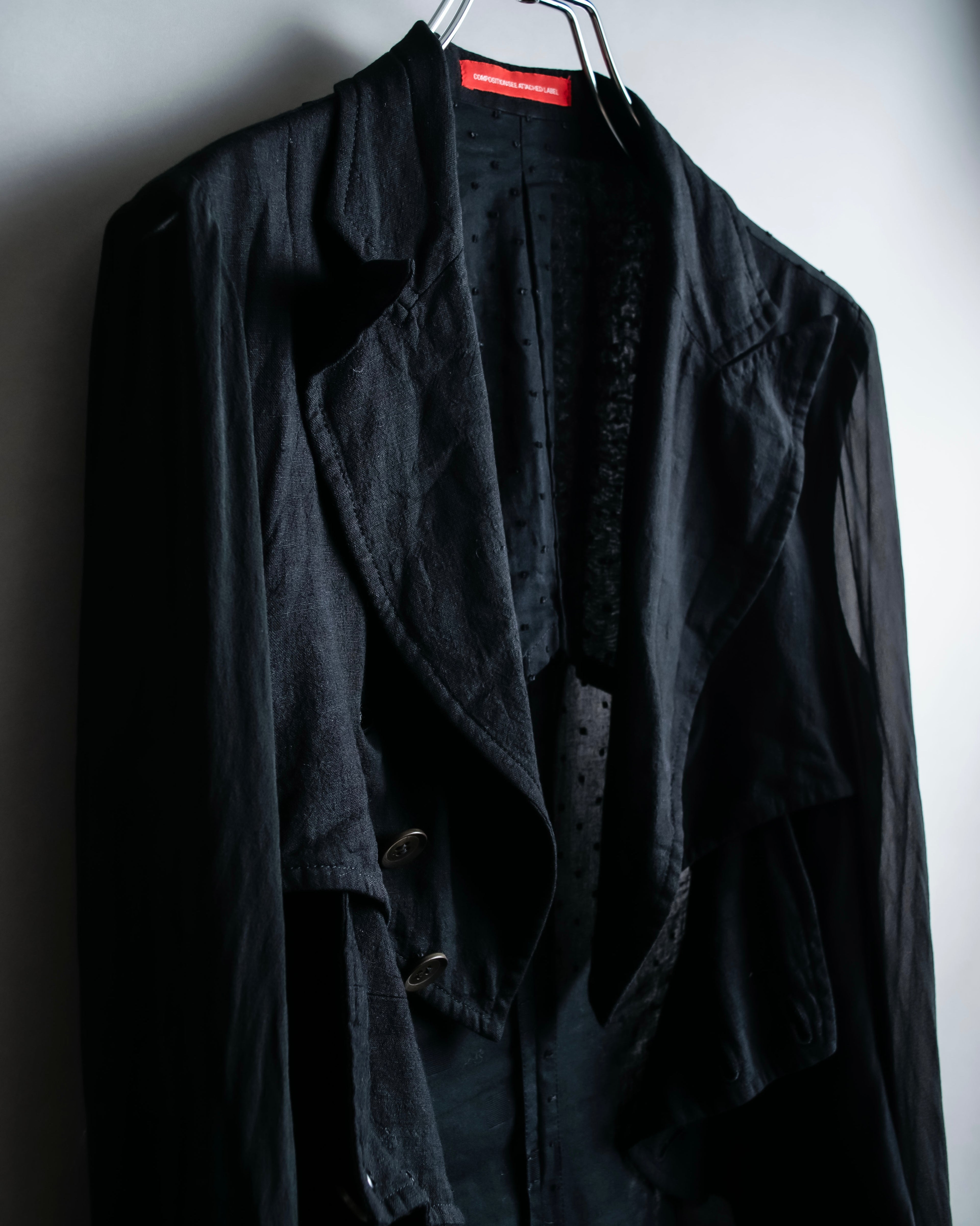 “Y’s COMPOSITION: SEE ATTACHED LABEL” Layered design multi buttons tail coat