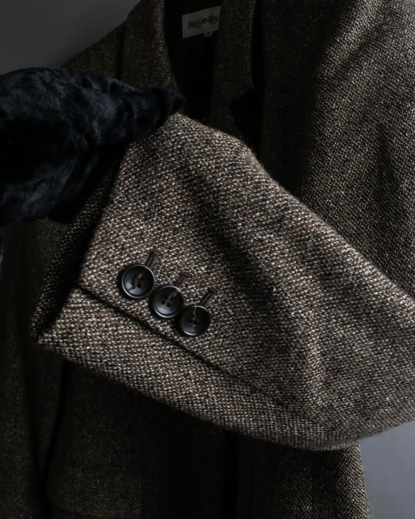 "Yves Saint Laurent Rive Gauche"
Fly front tweed chester coat