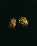 “Nina Ricci” 80's-90's Gold-tone floral clip-on earrings
