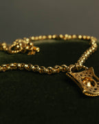 “NINA RICCI” Late 80’s-90’s gold tone openwork pendant necklace