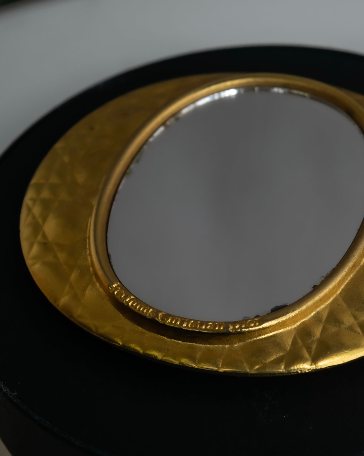 "Christian Dior" Cannage pattern engraved gold hand mirror