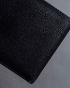 "LOEWE" Logo engraved bi-fold leather wallet