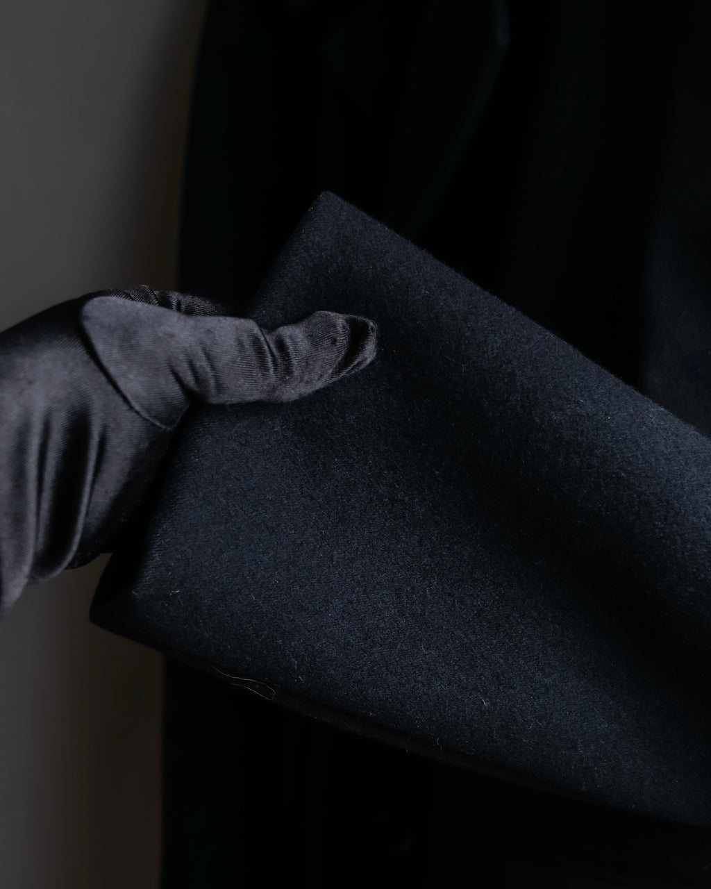 "JOHN LAWRENCE SULLIVAN"
 Large lapel double-breasted mid length coat