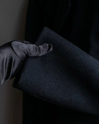 "JOHN LAWRENCE SULLIVAN"
 Large lapel double-breasted mid length coat