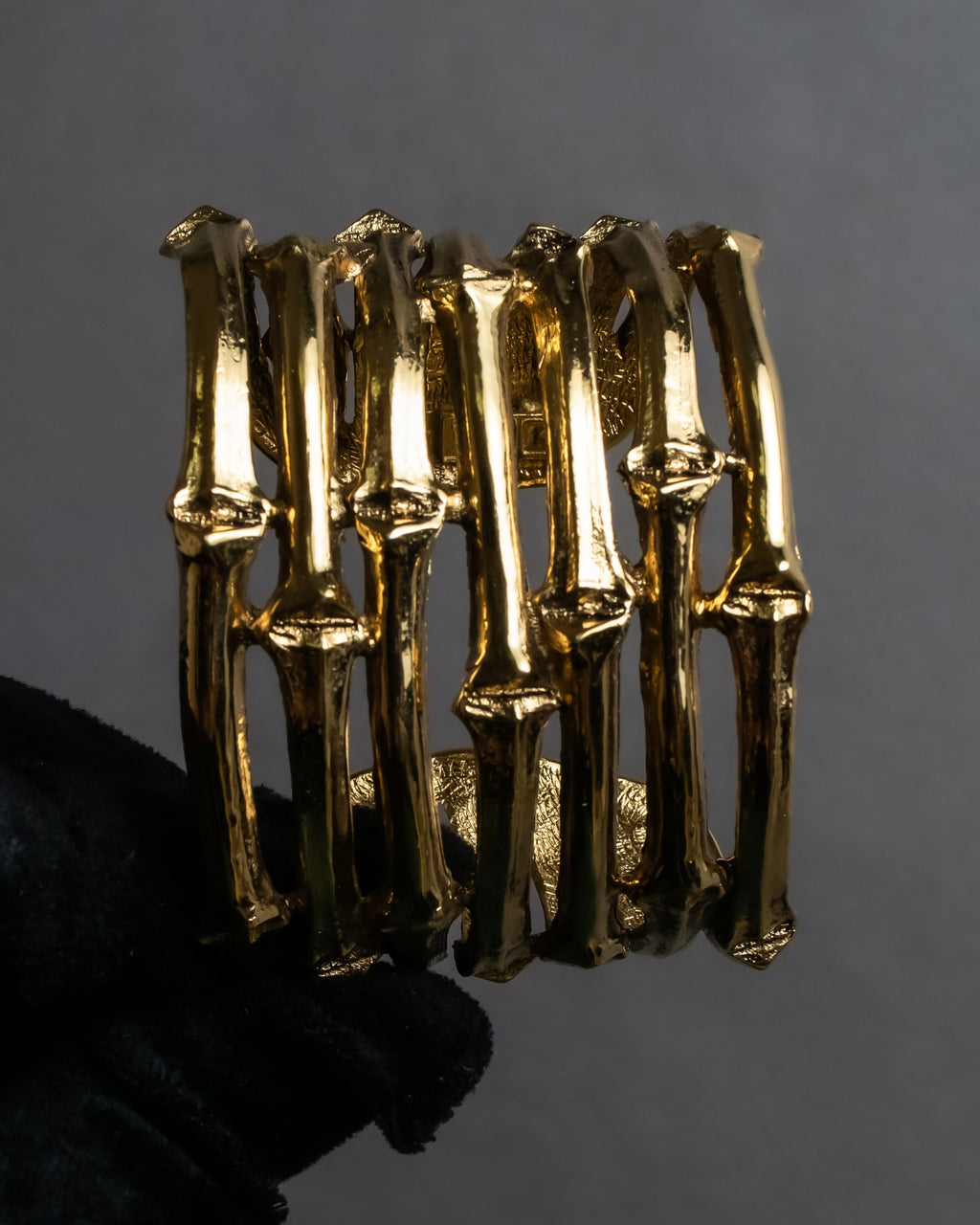 "YVES SAINT LAURENT" Skeletal arm shape design gold bangle