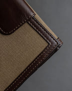 "PRADA" Logo engraved canvas＆leather combination short wallet