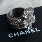 "CHANEL" Cocomark engraved rhinestone design camellia ring