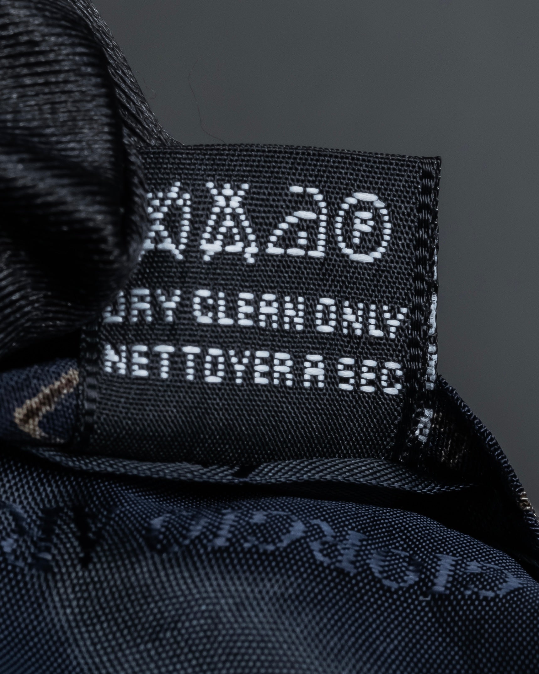 "ARMANI COLLEZIONI" Repeated triangle motif silk neck tie