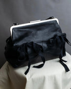 "MARNI" Side ribbon design rounded body leather bag