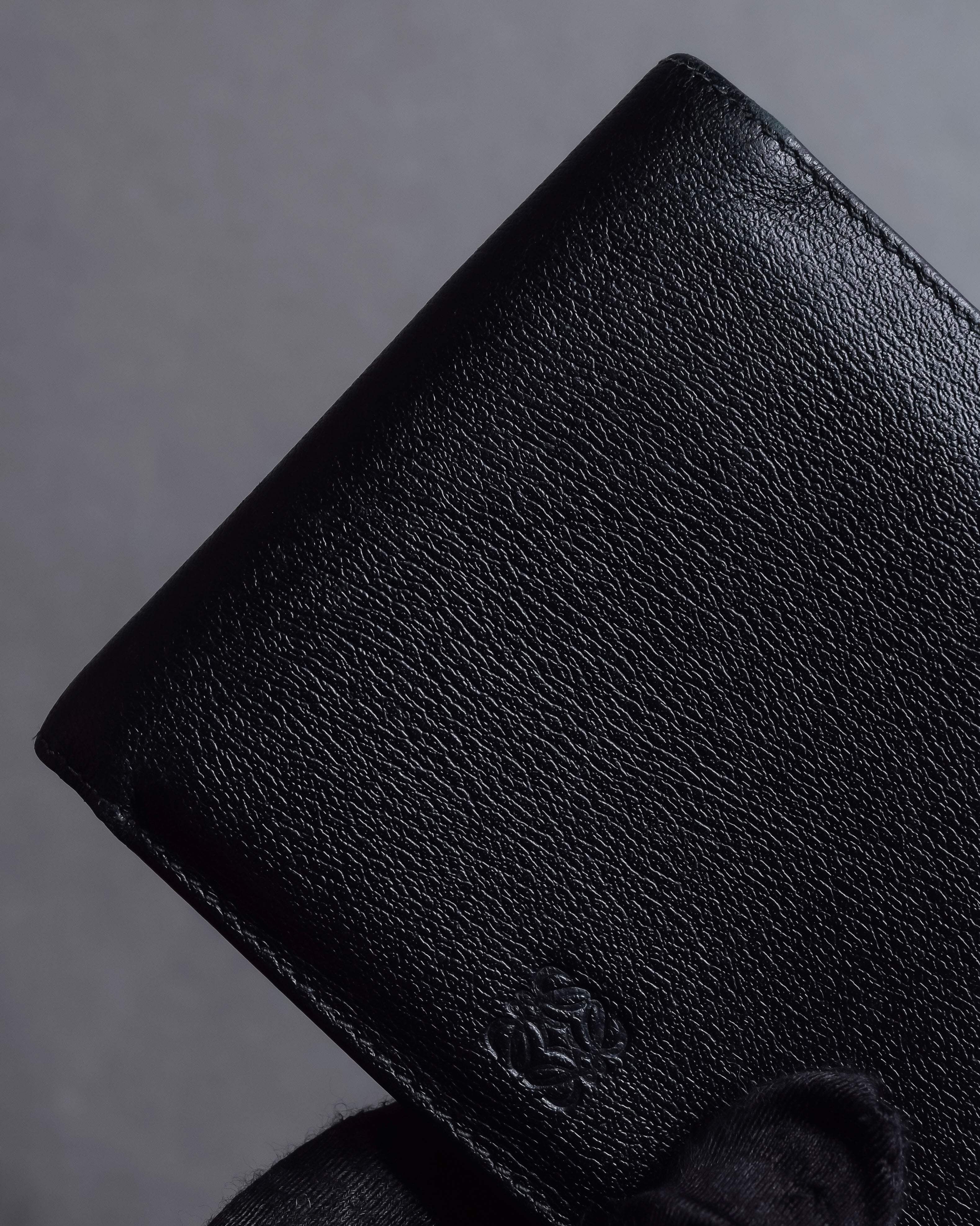 "LOEWE" Logo engraved bi-fold leather wallet