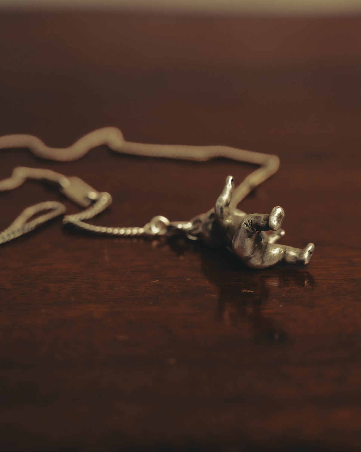 "Saint Laurent" 10's-20's Sculptural doll pendant necklace