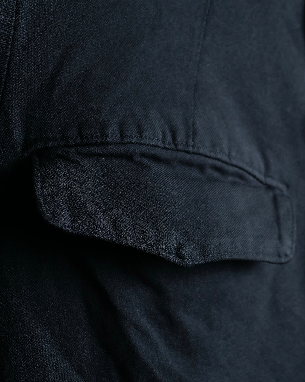 "COMME des GARCONS
COMME des GARCONS" 6 button detail raw edge jacket