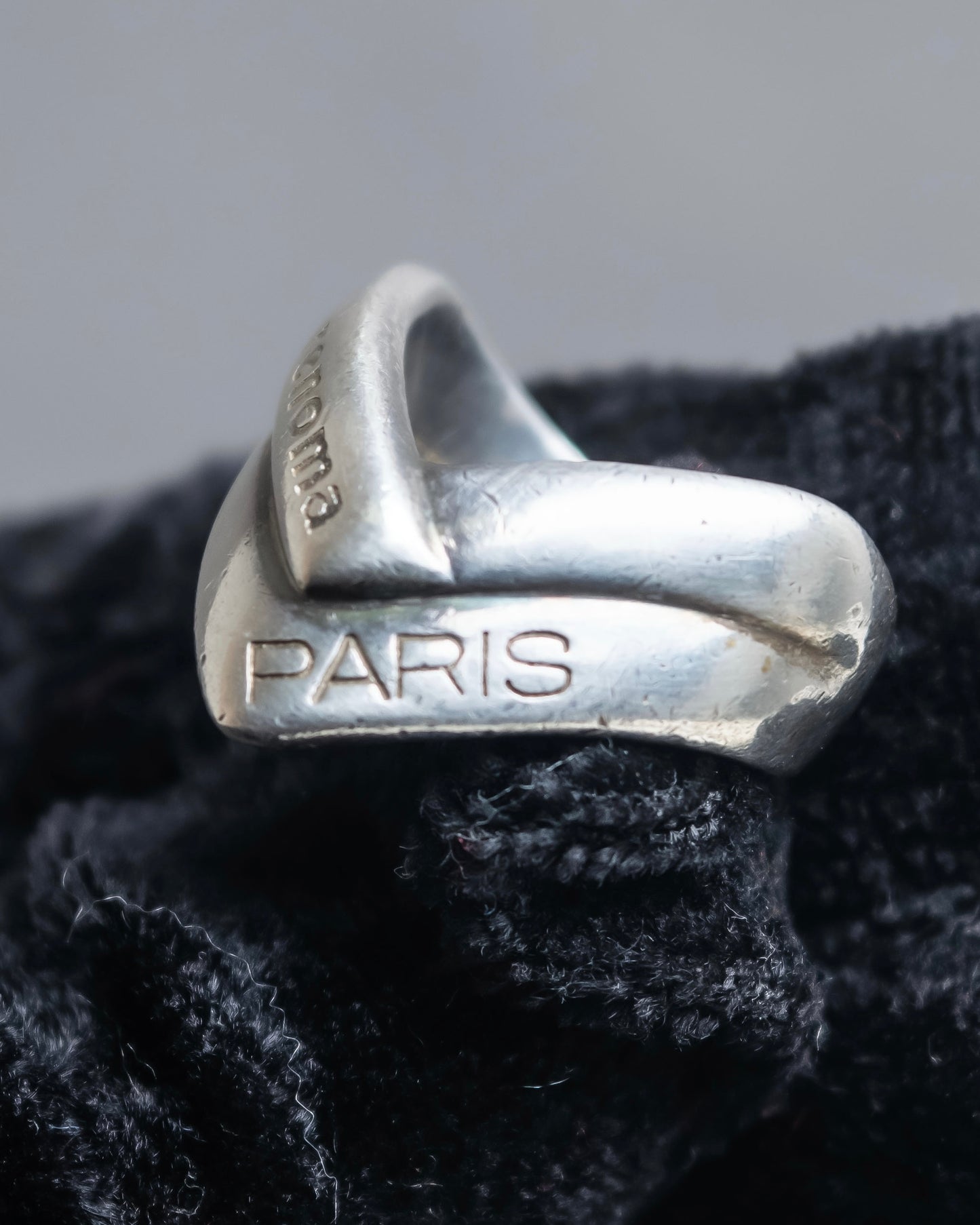 "renoma PARIS" Two-strand cross design smooth curved silver ring