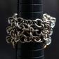 "SERGE THORAVAL" Crystal top chain braided ring