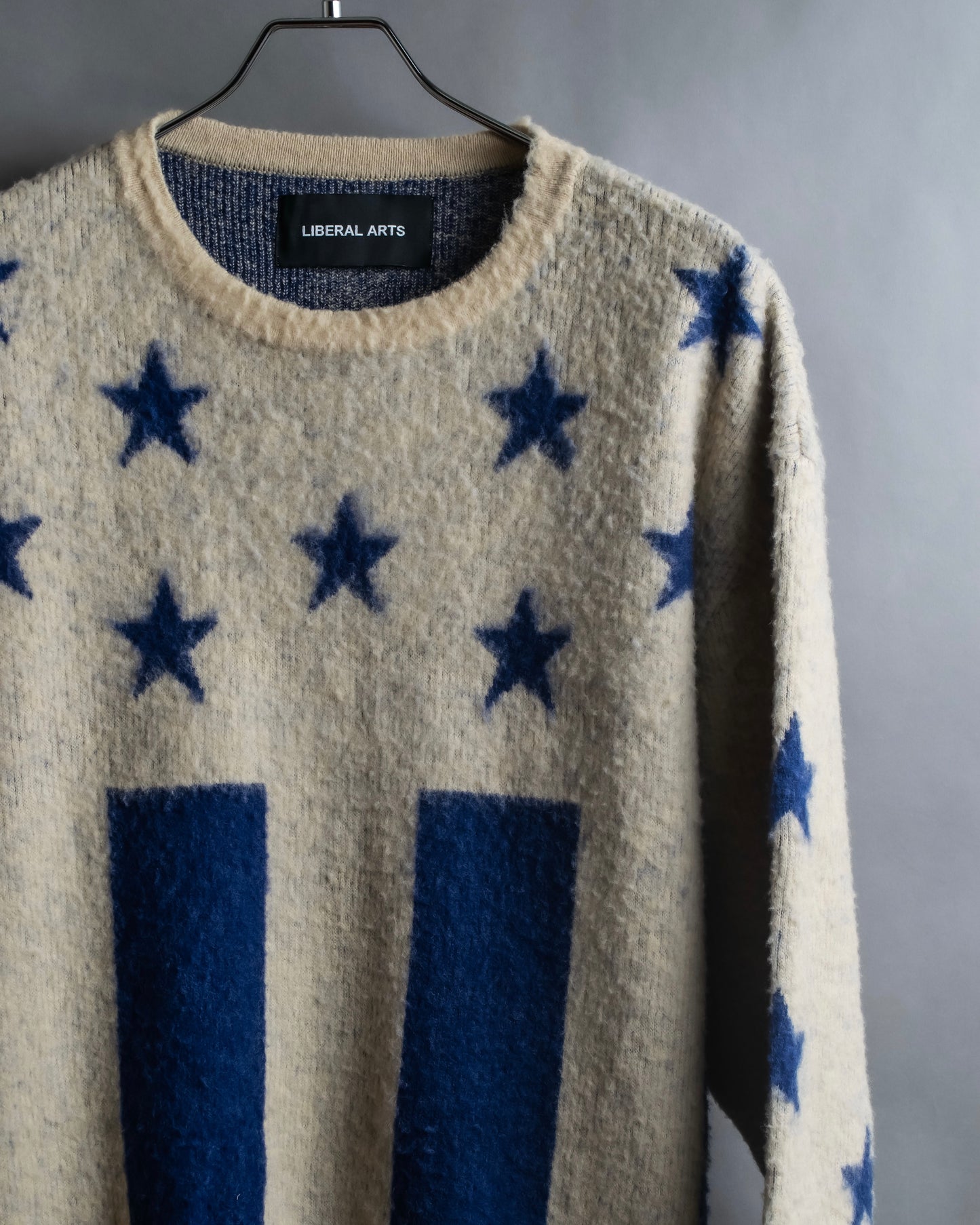 "LIBERAL ARTS" Star pattern oversized knit pullover