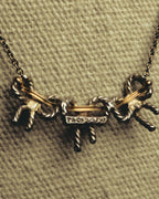 "Tiffany & Co." 80's-90's Sculptural triple bow necklace