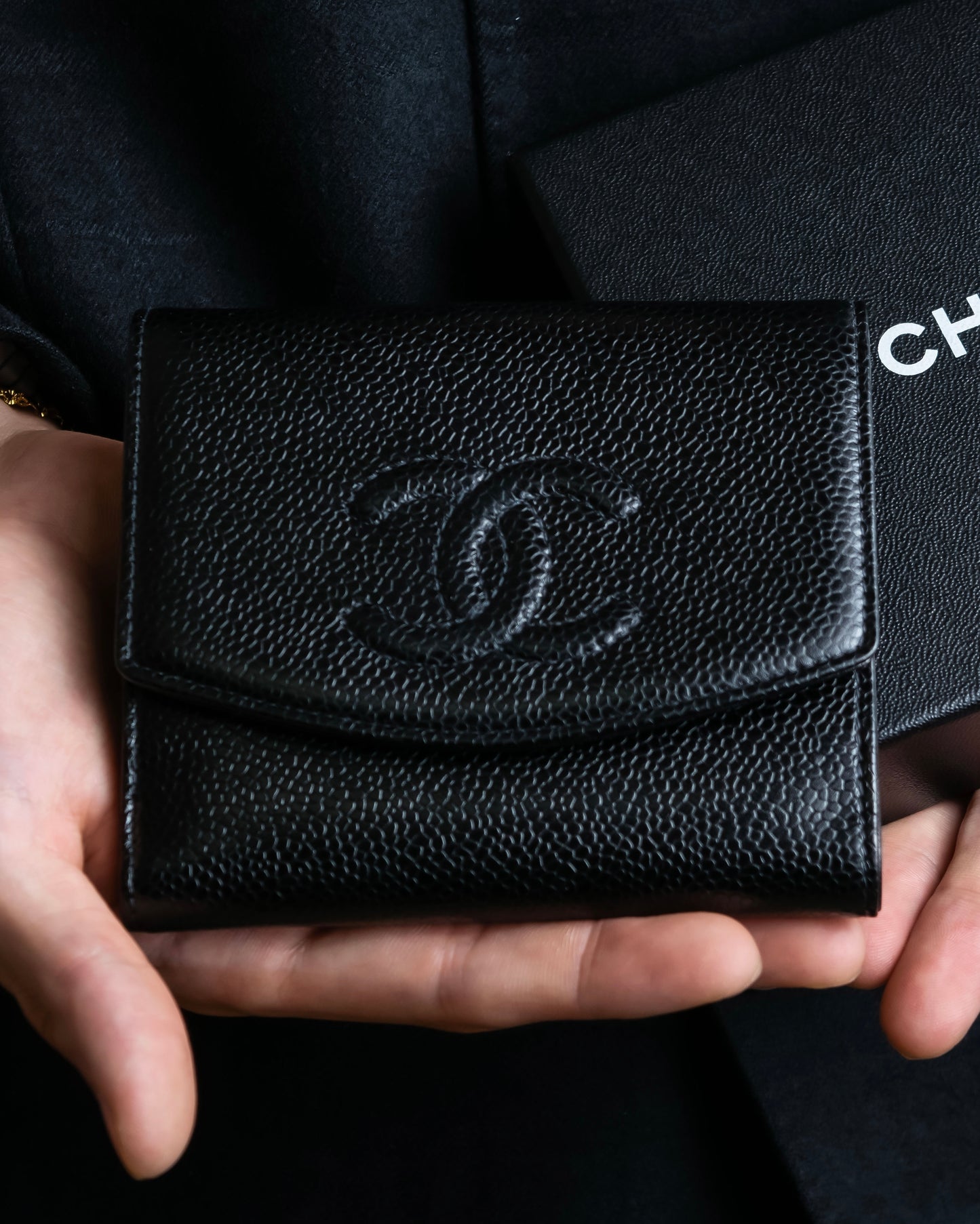 "CHANEL" Coco Mark engraved caviar skin bi fold wallet