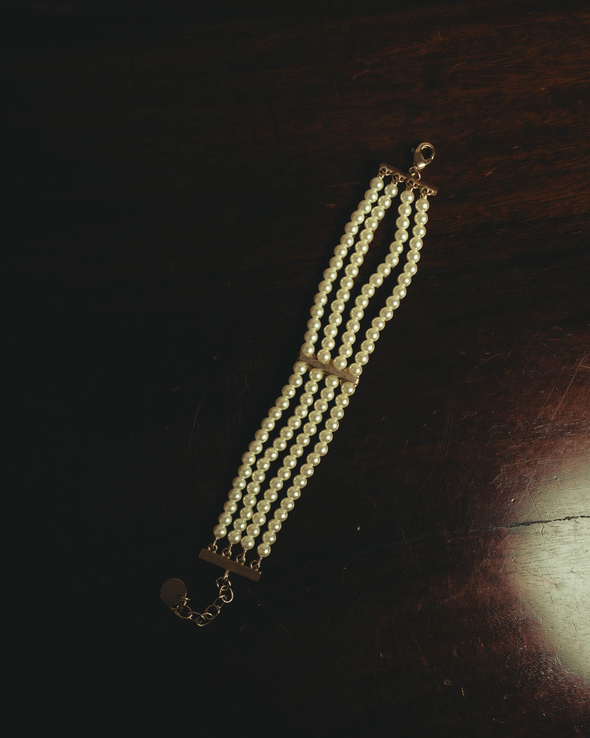 –SPECIAL– “Christian Dior” 2018-2025 Four-strand faux pearl bracelet with sculptural oval accents