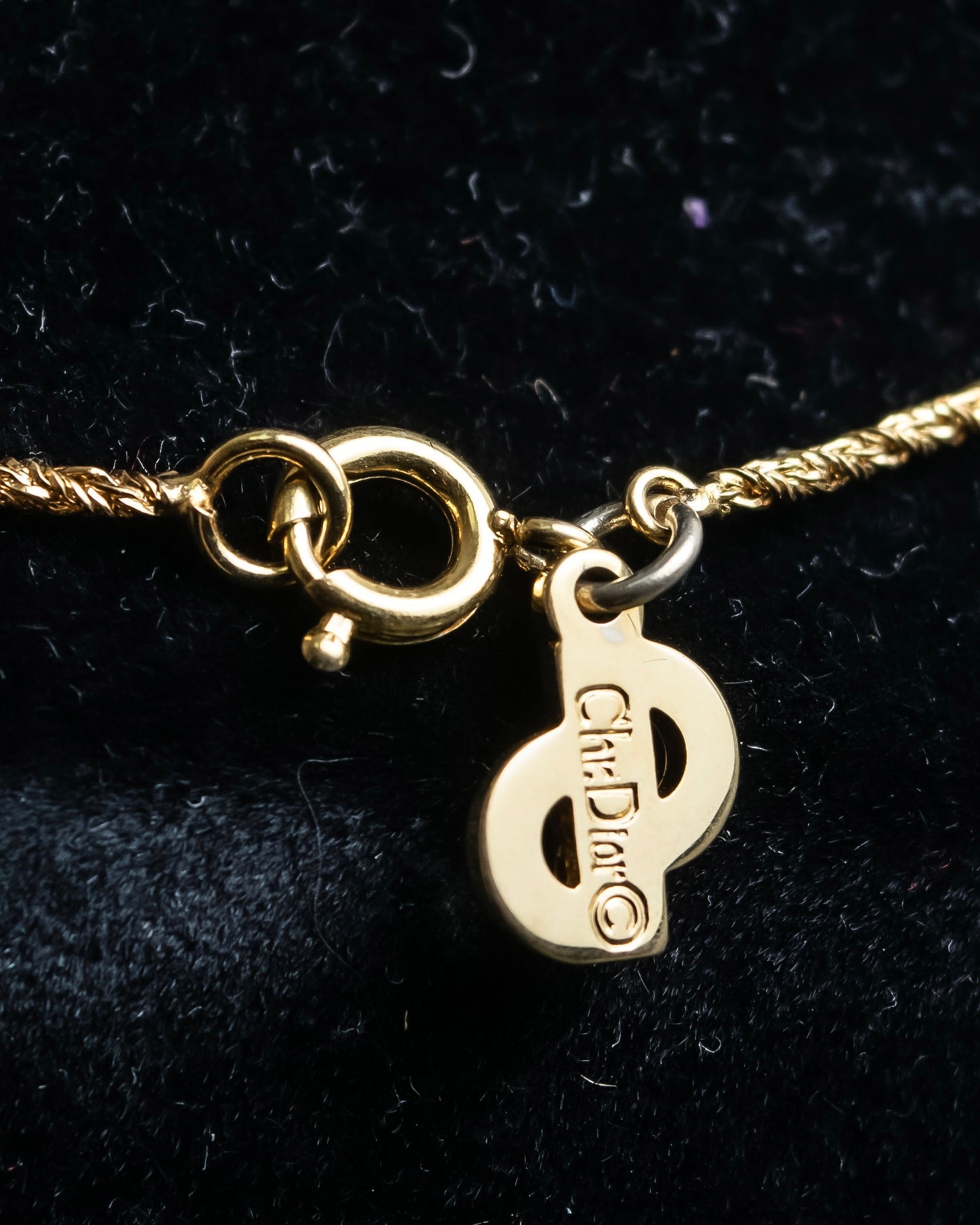 "Christian Dior" Trotter logo engraved gold pendan
