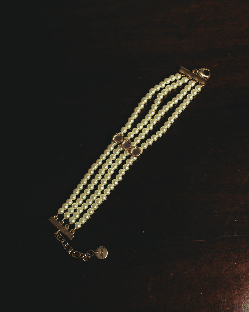 –SPECIAL– “Christian Dior” 2018-2025 Four-strand faux pearl bracelet with sculptural oval accents