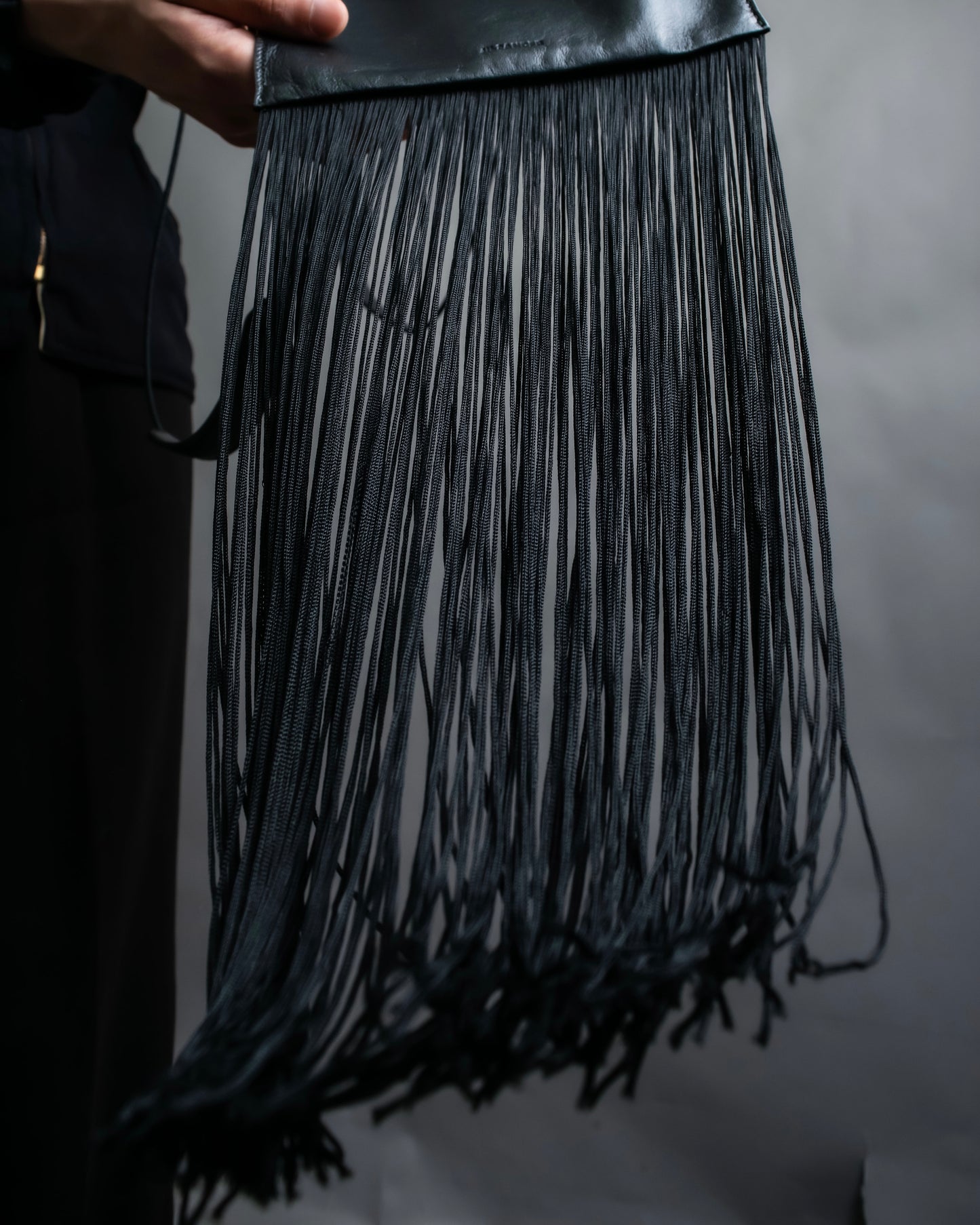 “JIL SANDER”  Fringe detail flat drawstring shoulder bag