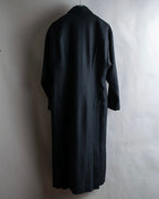 Tight-waisted wool shirt and black coat