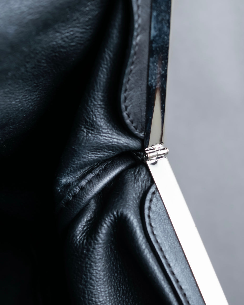 "MARNI" Side ribbon design rounded body leather bag