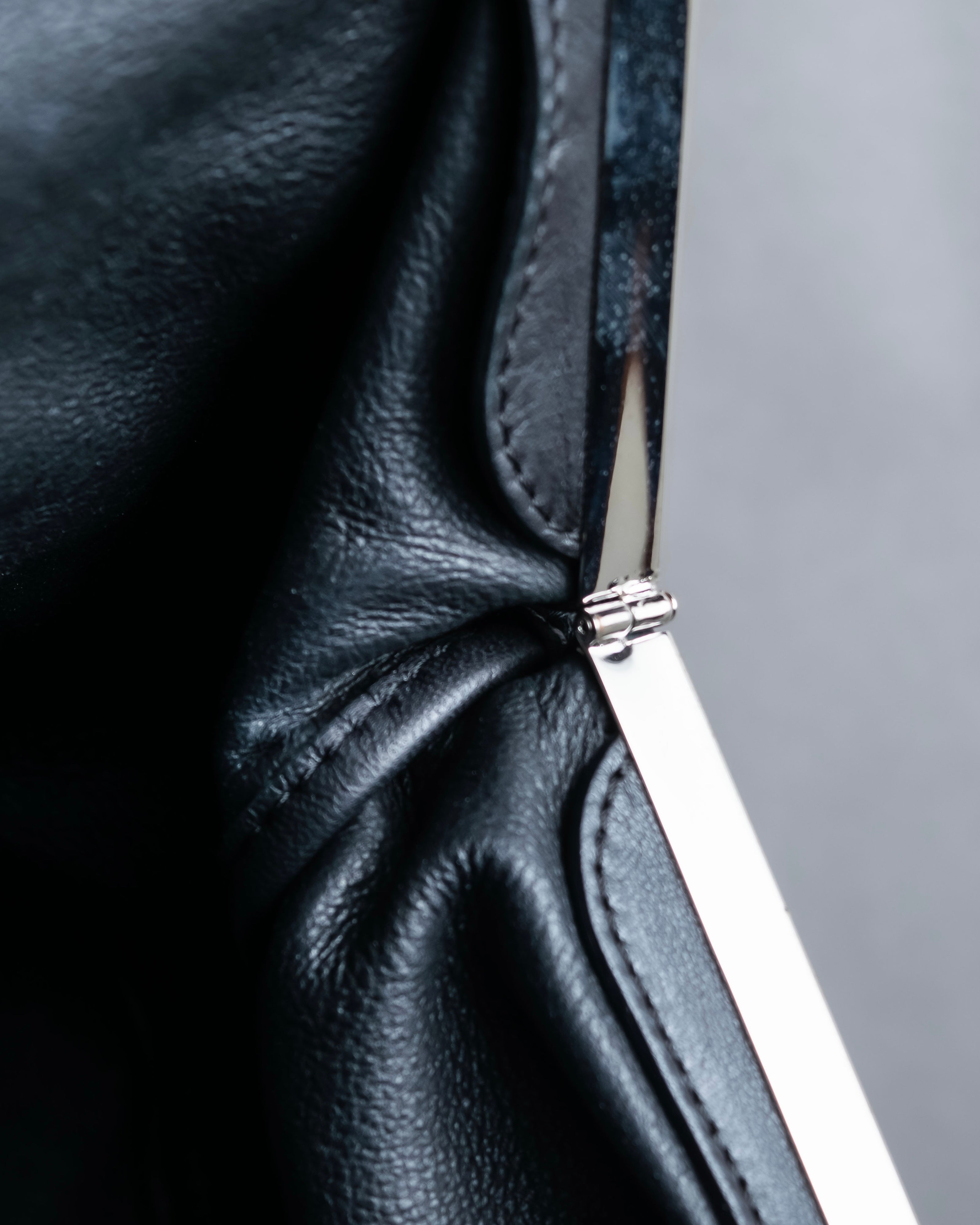 "MARNI" Side ribbon design rounded body leather bag