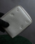 "MAISON MARGIELA" White grain leather round zipper wallet