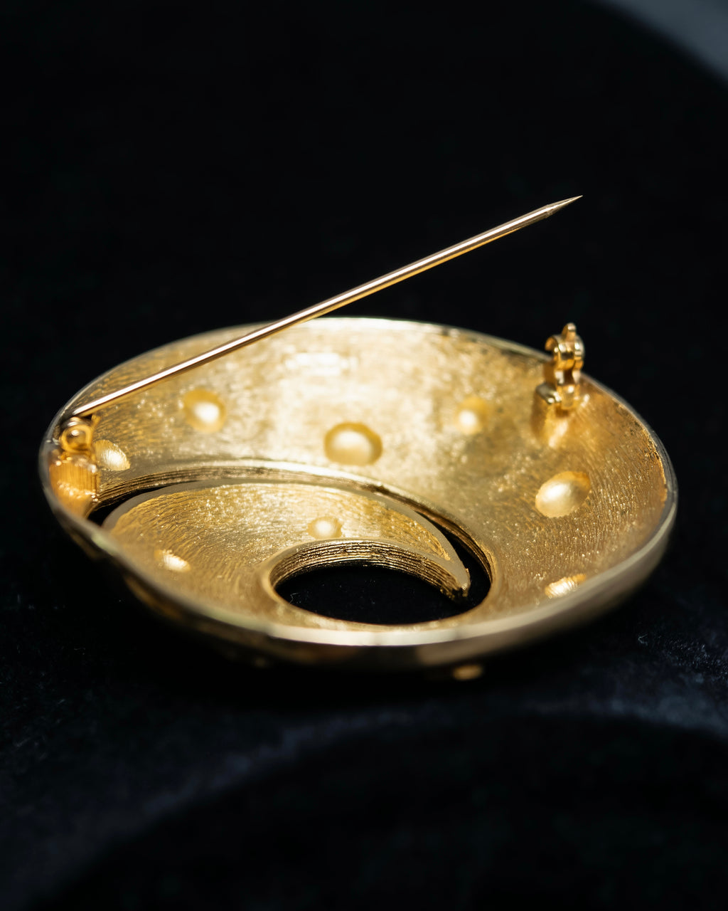 "DIOR" Gold spiral motif brooch